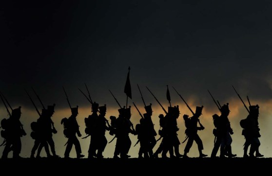 TOPSHOTS History enthusiasts dressed as soldiers take part in a re-enactment of Napoleon's 1805 Battle of Austerlitz near the South Moravian city of Slavkov on December 01 , 2012. AFP PHOTO/MICHAL CIZEKMICHAL CIZEK/AFP/Getty Images ORG XMIT: 575